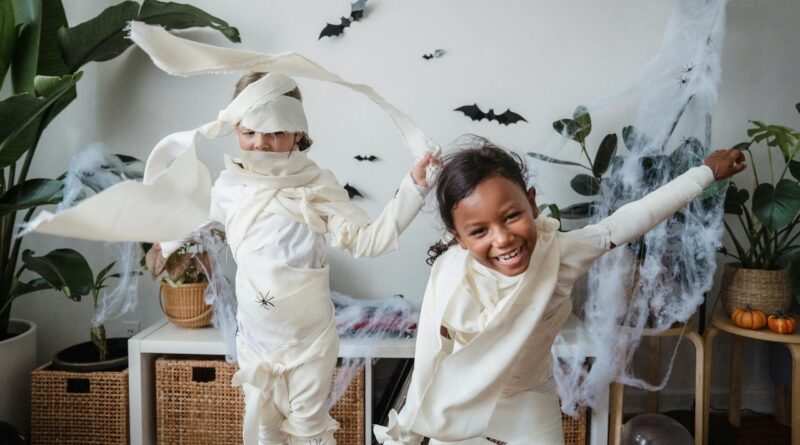 Kids in mummy costumes | Photo by Mike Jones, pexels, 9740478