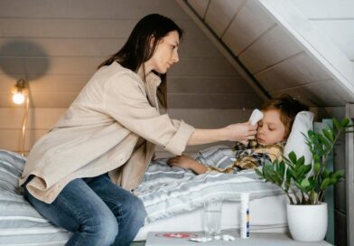 A mother caring for a sick child | Photo by mart production, pexels 7641242