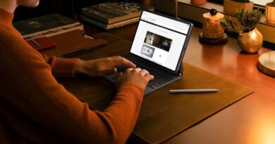 Person using Xiaomi Pad 8 Pro with the keyboard