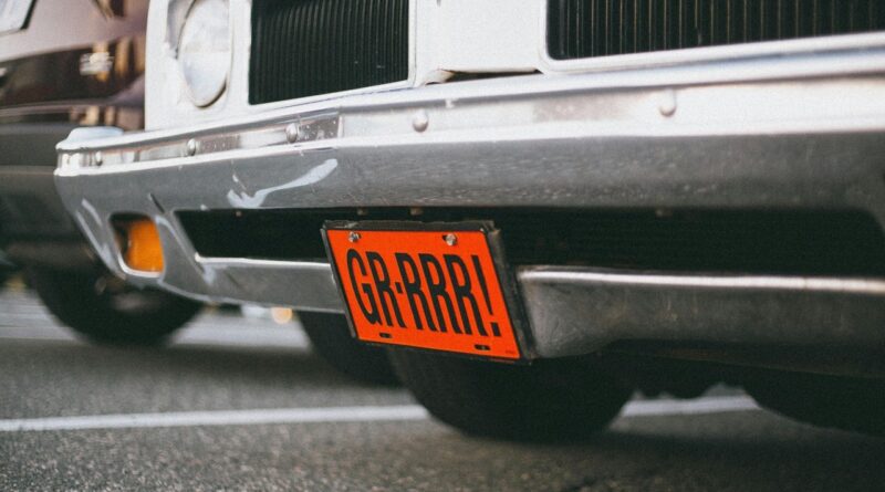 Car with a red number plate