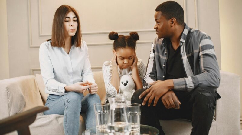 Parents arguing and an upset child