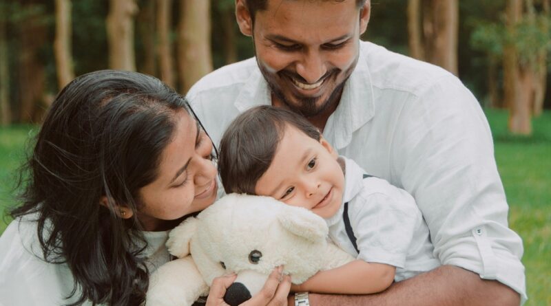 Happy Family with Teddy Bear